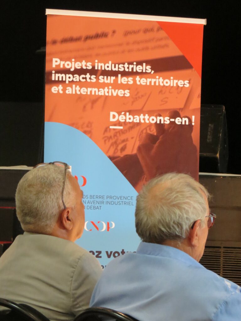 Debat-public-Participants-a-une-reunion-publique-Photo-JC-Barla-scaled.jpg
